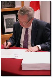 Chief Electoral Officer Marc Mayrand signs the writs for the 42nd general election