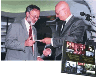 Chief Electoral Officer Jean-Pierre Kingsley presents Museum of Civilization President Dr. Victor Rabinovitch (left) with a copy of the Elections Canada CD-ROM, Explore A History of the Vote in Canada, at the 80th anniversary celebration at the museum.