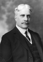 Black-and-white portrait of Sir Robert Borden facing the camera.