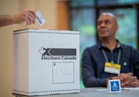 An elector casting a ballot